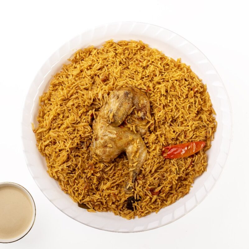 دجاج مضغوط مع الرز (نص حبة)