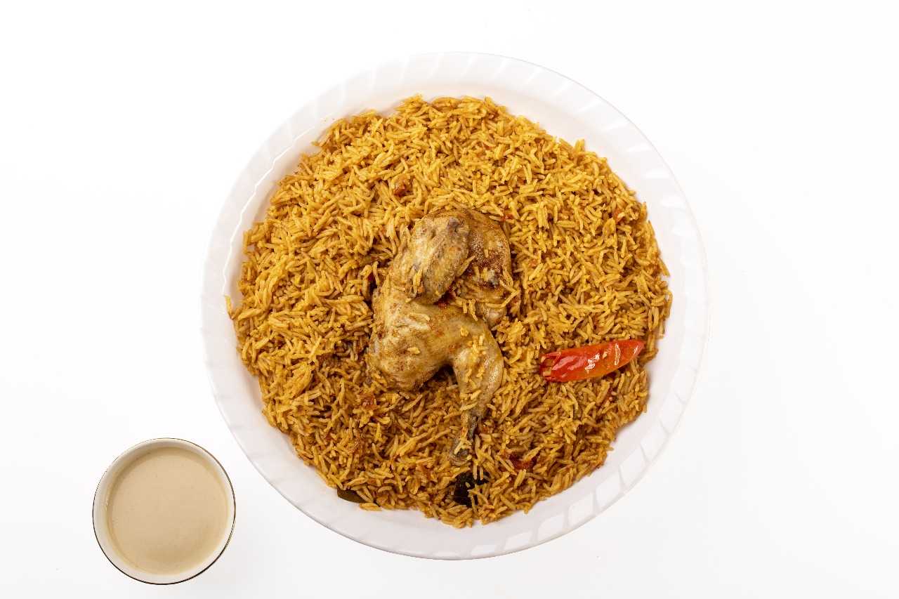 دجاج مضغوط مع الرز (نص حبة)